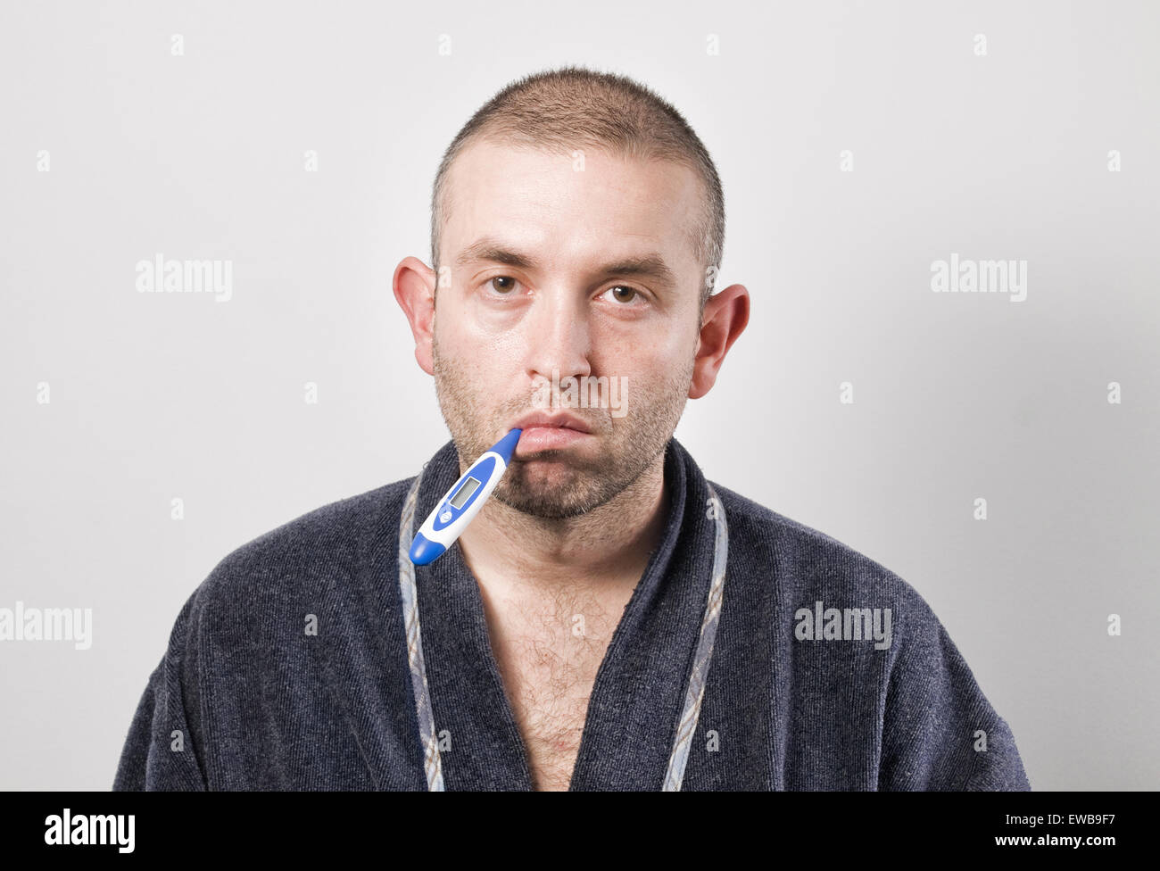 Man suffering the first symptoms of the ebola virus. In the beginning, the virus can be confused with flu. Stock Photo