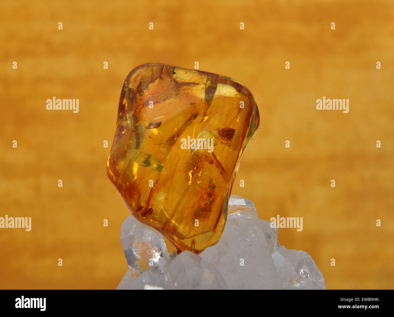 Amber on rock crystal Stock Photo Alamy