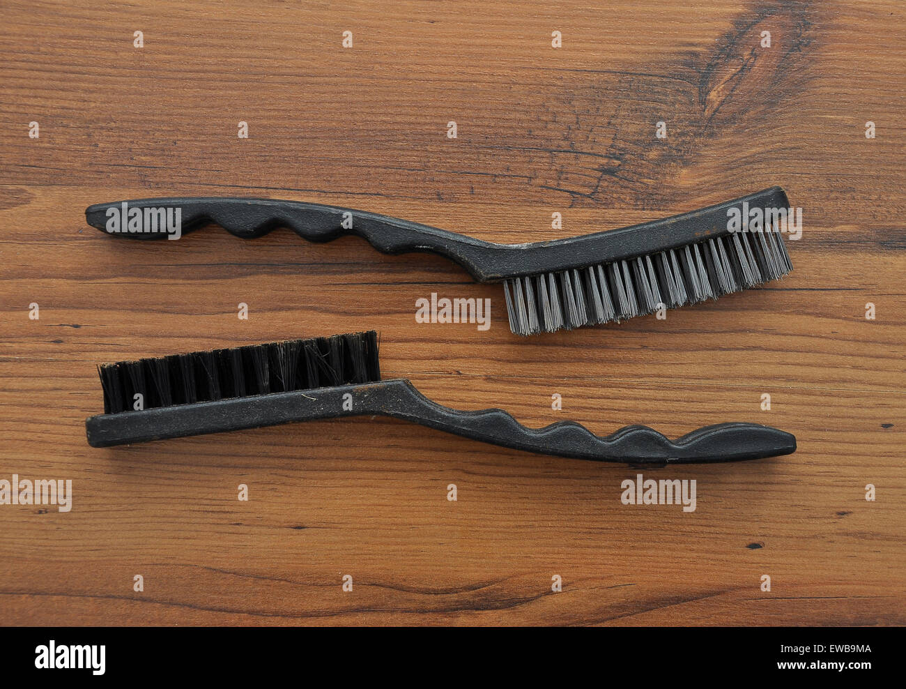 Wire brushes on wood Stock Photo Alamy