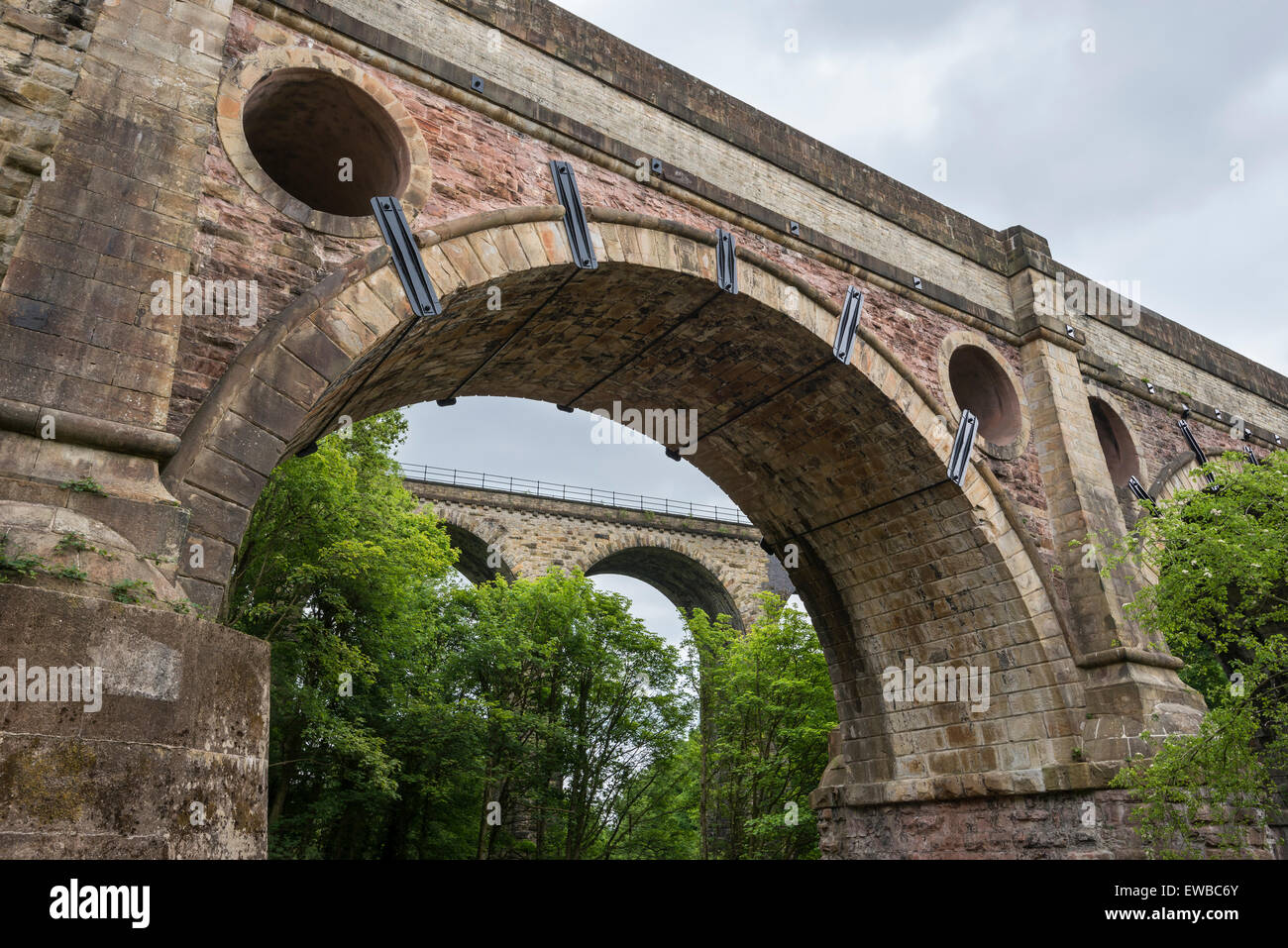 The newly restored stone arches of Marple aquaduct in Greater Manchester. A feature of the Peak Forest canal. Stock Photo