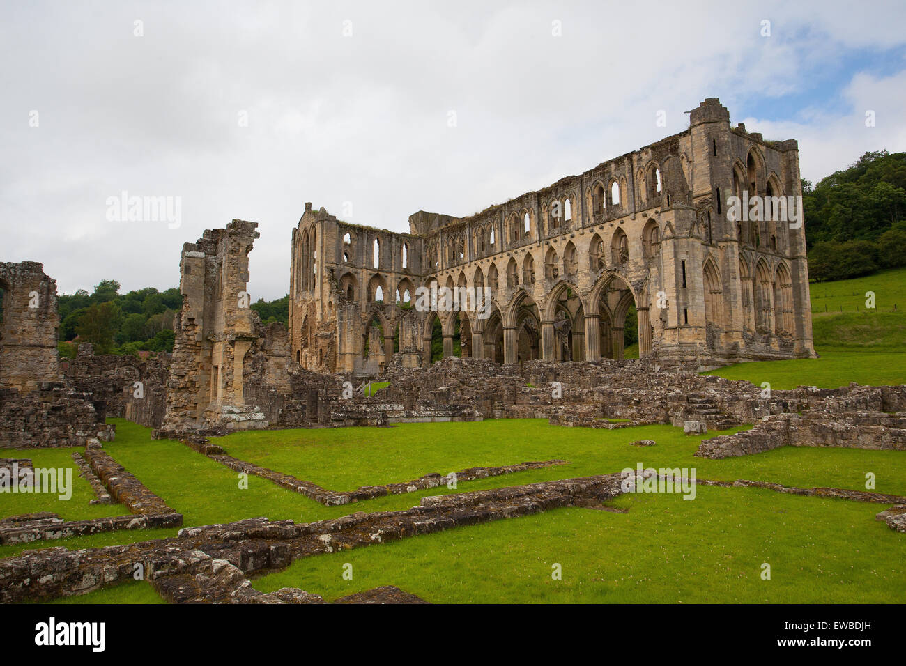 Scenic view of ruins of Rievaulx Abbey under cloudscape, North Yorkshire Moors, National Park, England Stock Photo