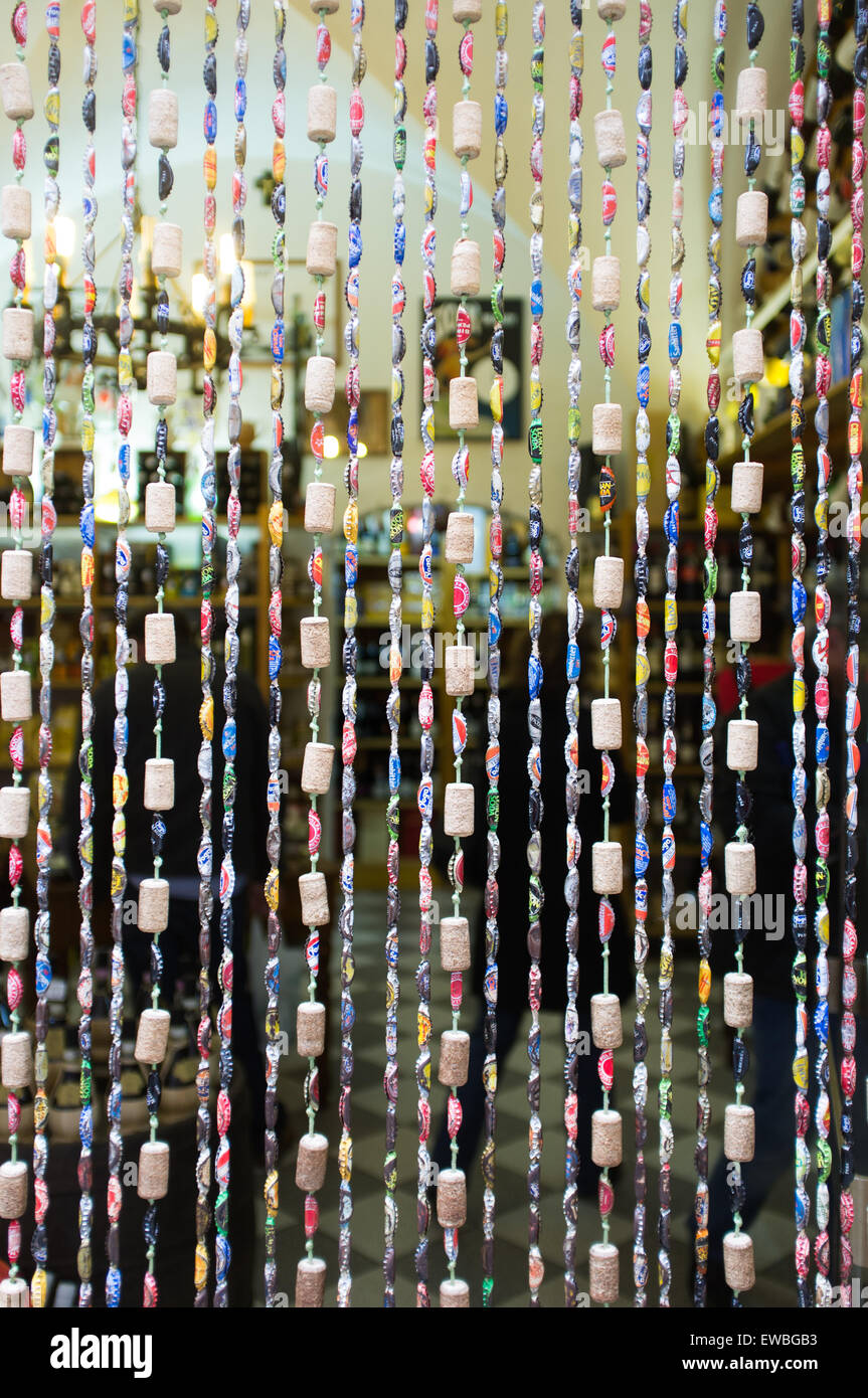 Beaded curtain across grocery in Lucca, Italy Stock Photo
