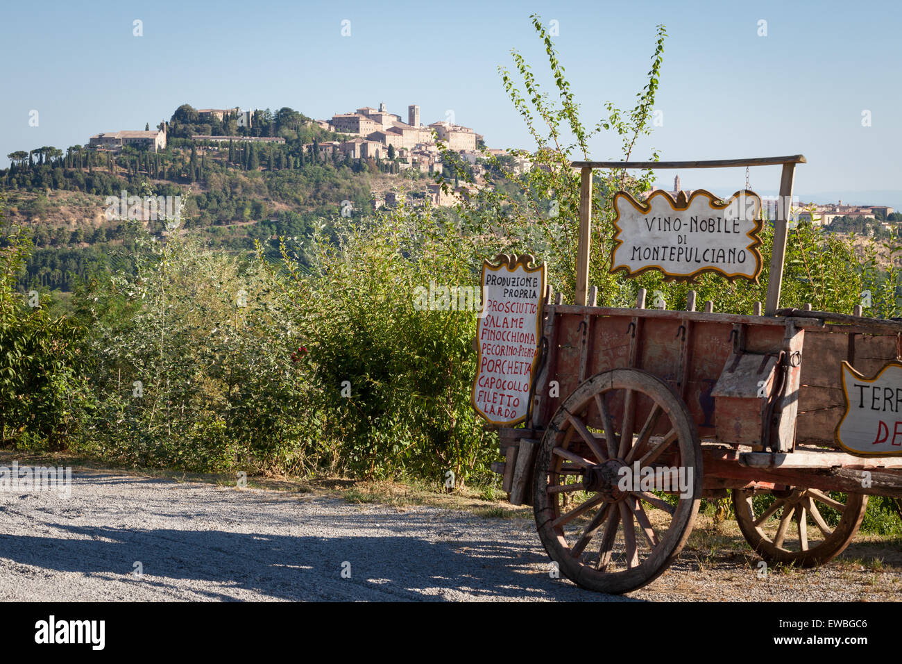Old Wine cart with Montepulciano in background Stock Photo