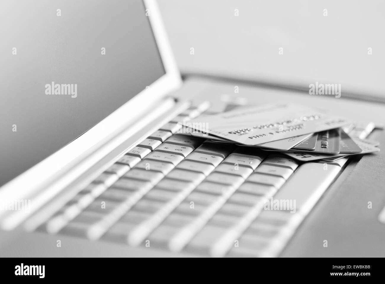 Credit cards on a laptop keyboard. payment concept Stock Photo