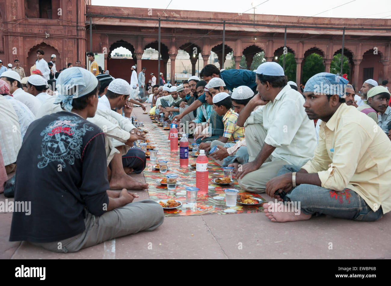 Traditional Iftar (fast-breaking) at Jama Masjid during Ramadan. Old Delhi, India. Stock Photo