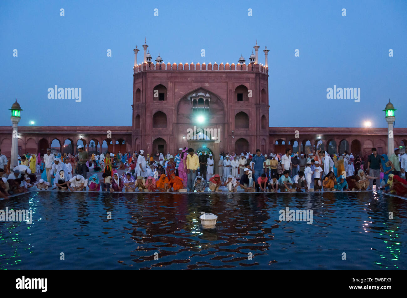 People at the ablution pond in Jama Masjid during Ramadan. Old Delhi, India Stock Photo