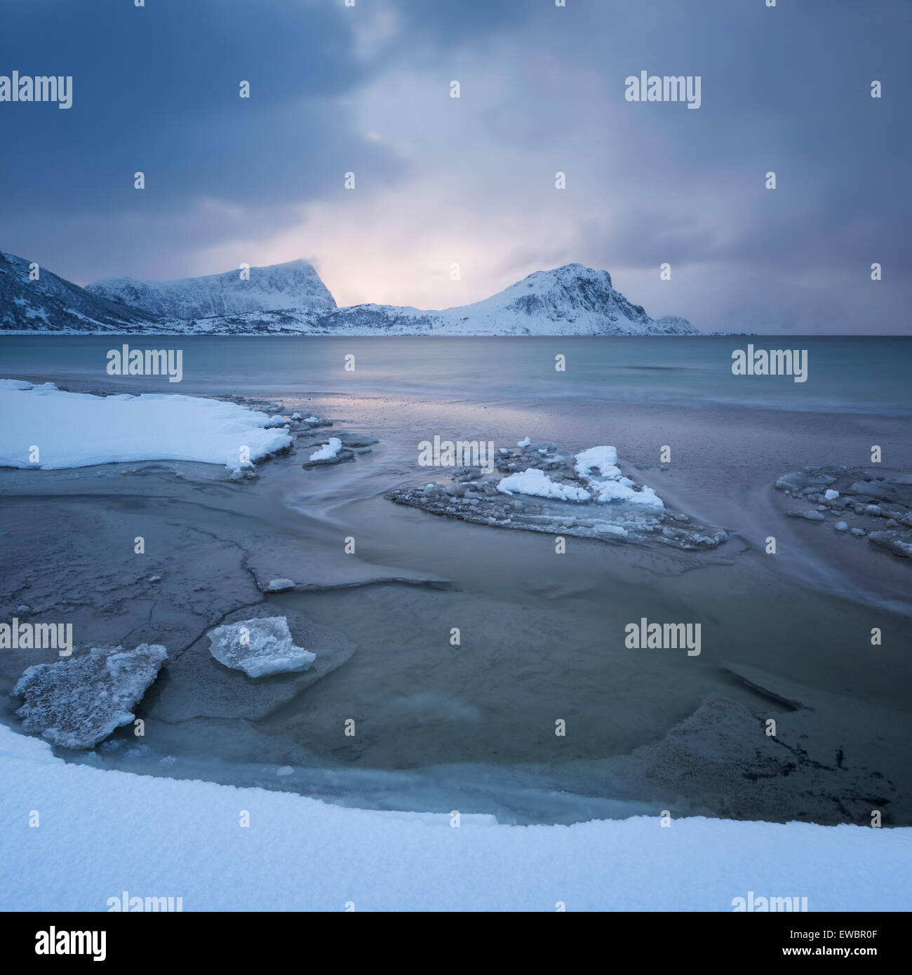 Snow covered Haukland beach in winter, Vestvågøy, Lofoten Islands, Norway Stock Photo