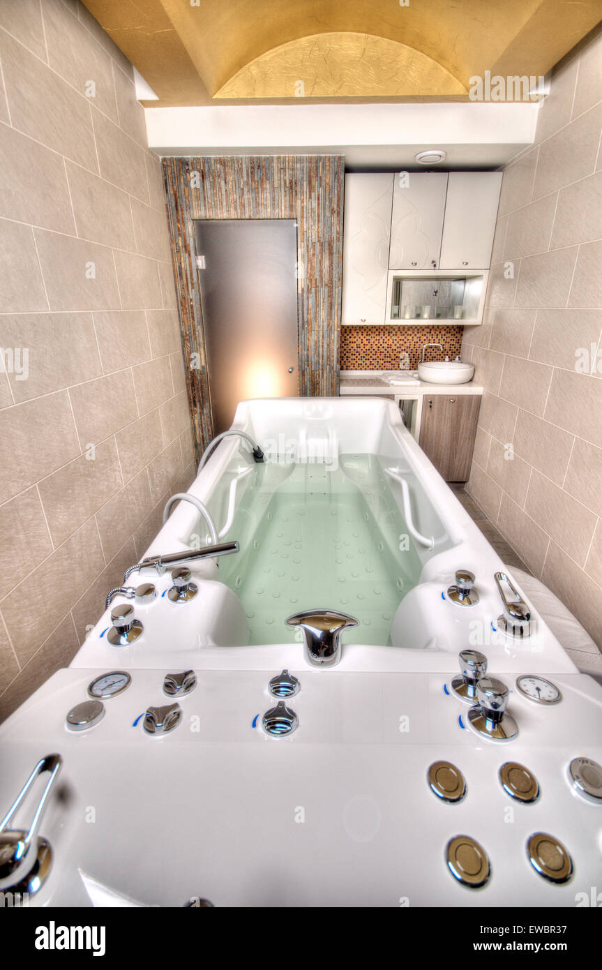 Jacuzzi Spa Bathtub in a marble bathroom Stock Photo Alamy