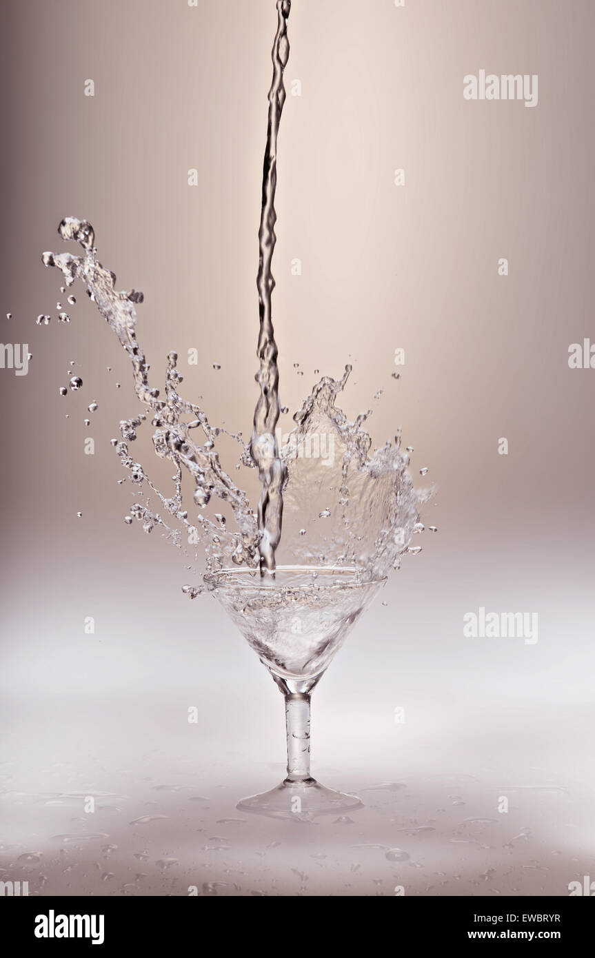 cold splashing water drink with ice cube Stock Photo - Alamy