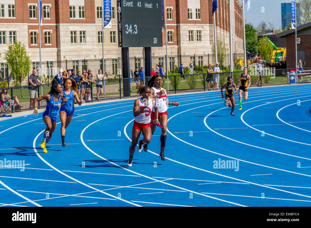 Relay race for women at the Kentucky Relays.  This was held at the University of Kentucky with outdoor track and field Stock Photo