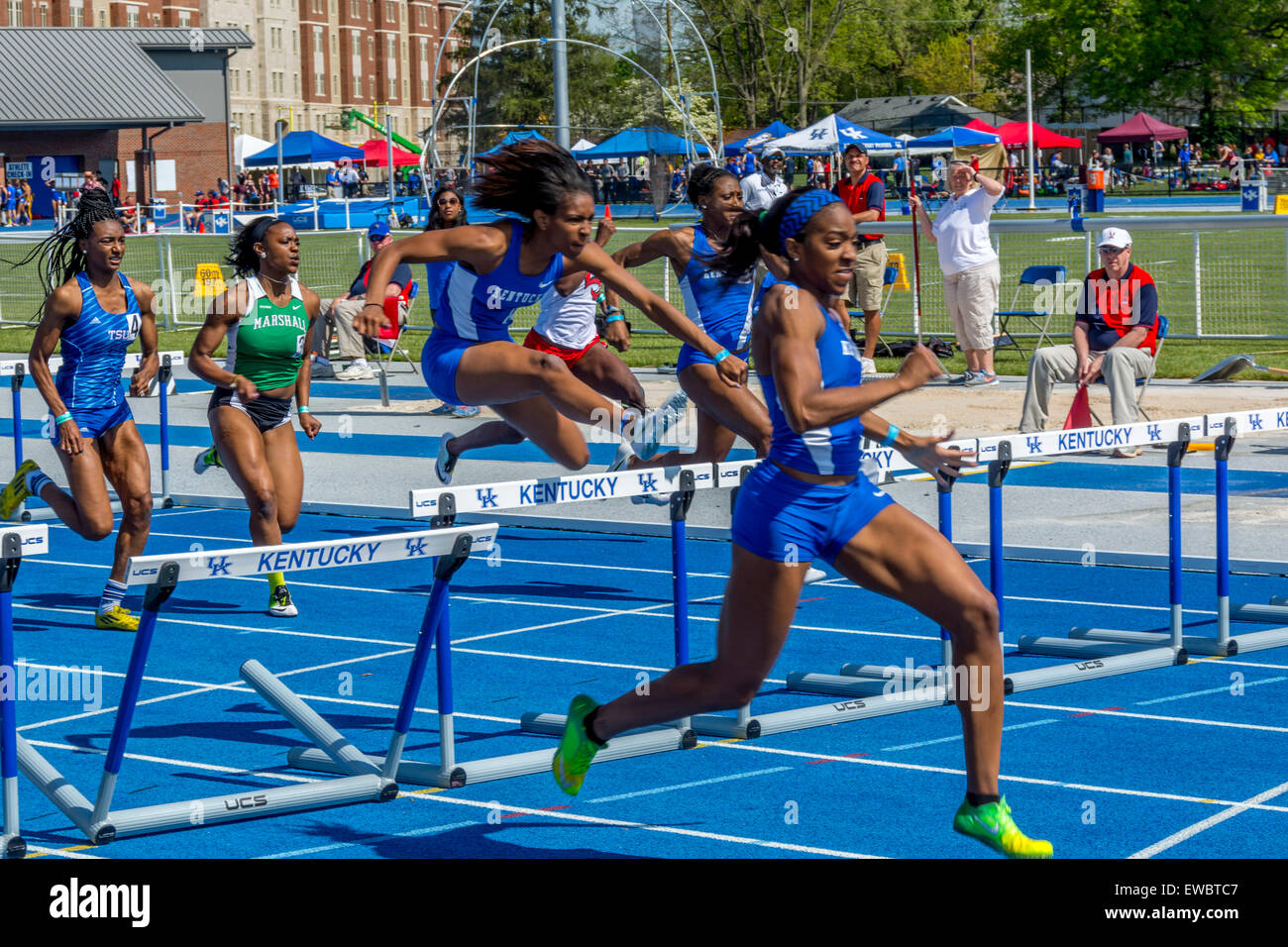 Hurdles for women at the Kentucky Relays.  This was held at the University of Kentucky with outdoor track and field competitive Stock Photo