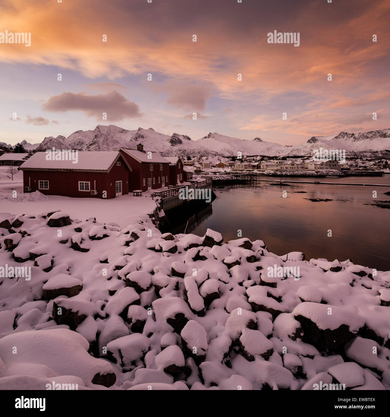 Red huts at sunset in winter, Kabelvåg, Austvågøy, Lofoten Islands, Norway Stock Photo