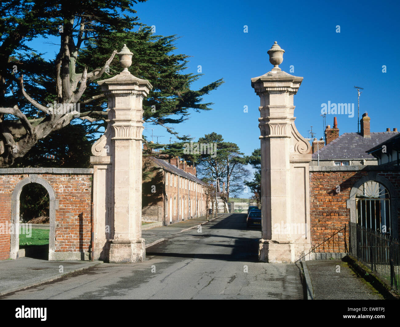 Bulkeley estate workers houses and gateway,Stanley Street, Beaumaris Anglesey, North Wales, UK Stock Photo