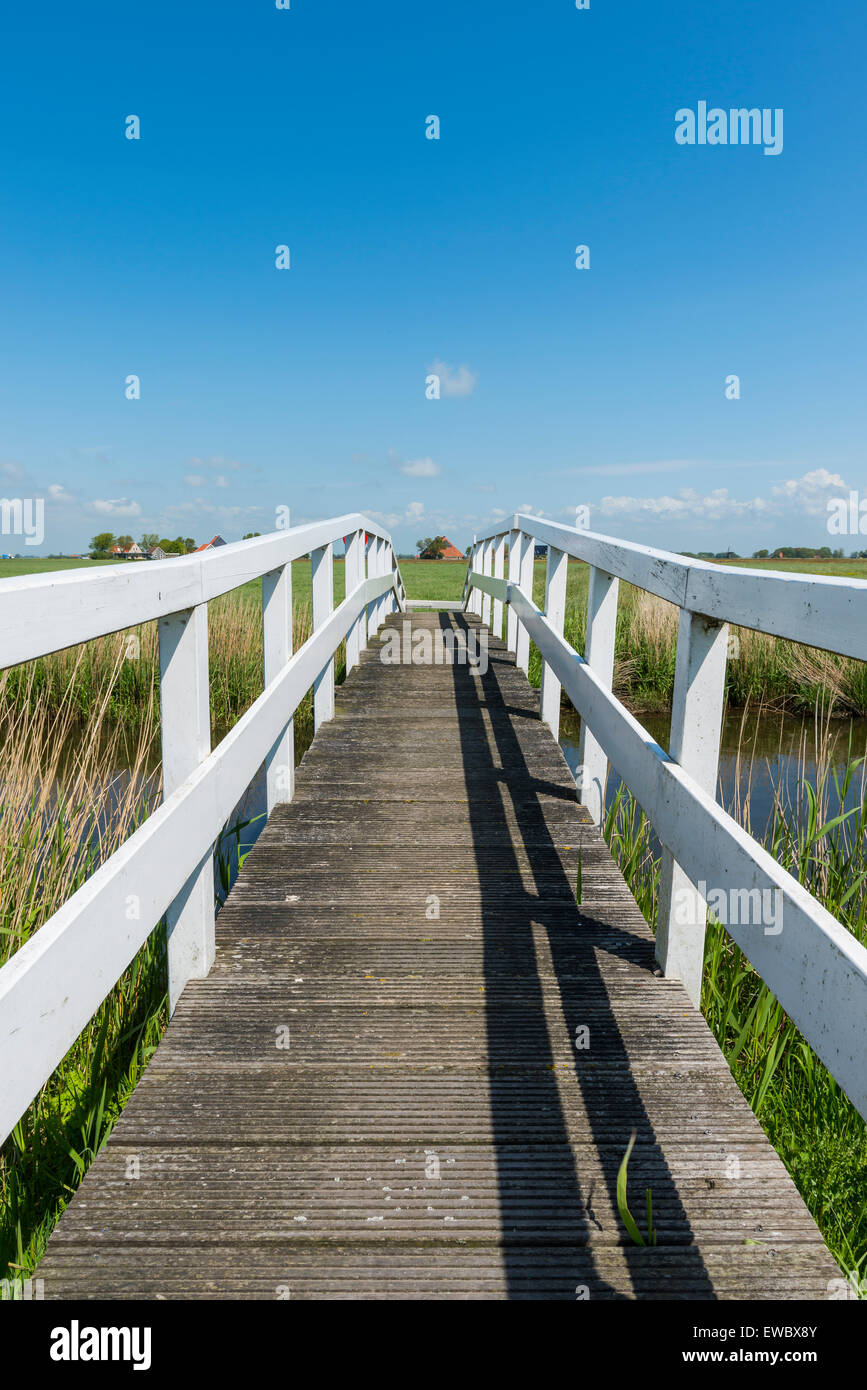 Picturesque white bridge for hikers at Workum in summer in province Friesland near Lemmer, The Netherlands, image Daan Kloeg, Co Stock Photo
