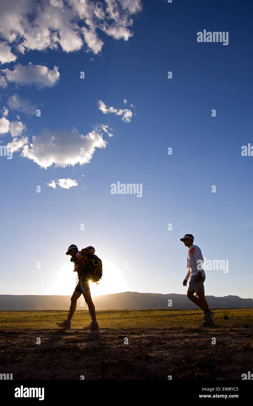 Adventure racers hiking in the desert in a race in Moab, Utah ...