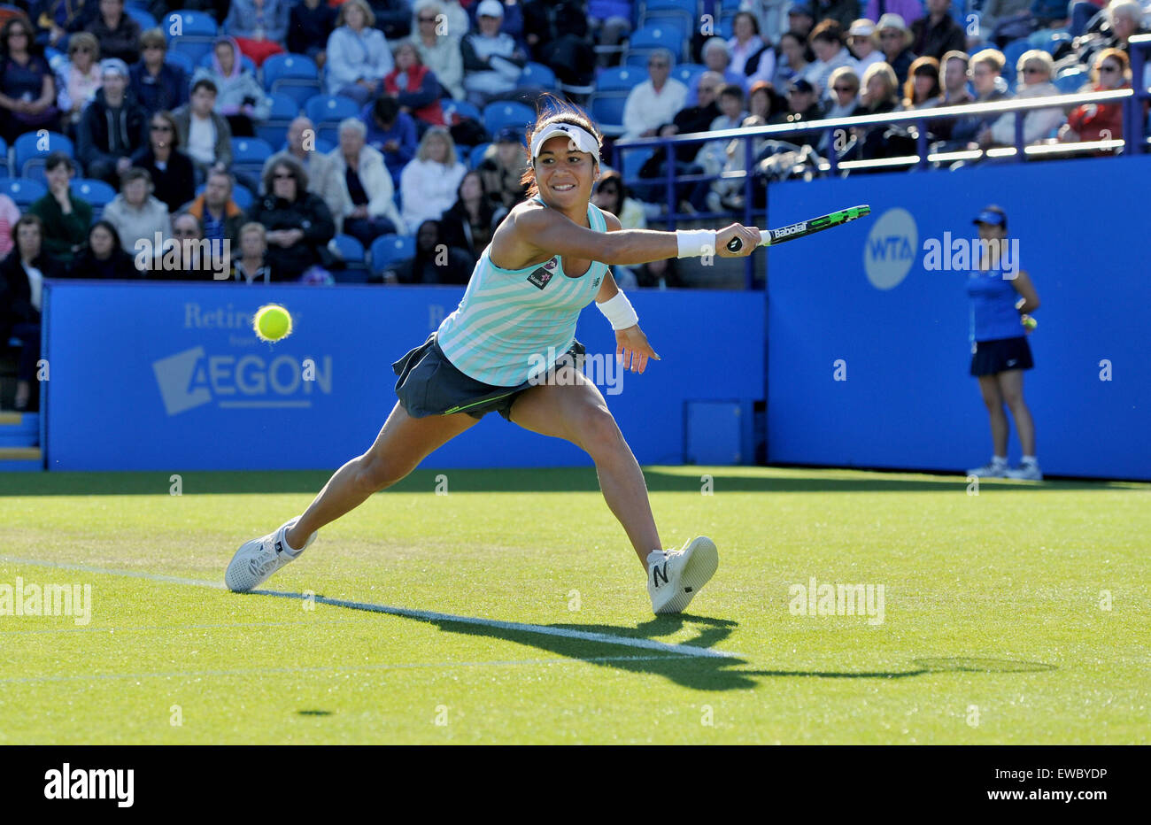 Eastbourne, Sussex, UK. 22nd June, 2015. Heather Watson of Great Britain stretches for a backhand shot against Varvara Lepchenko of the USA in their tennis match at the Aegon International tennis tournament held in Devonshire Park Eastbourne   Credit:  Simon Dack/Alamy Live News Stock Photo