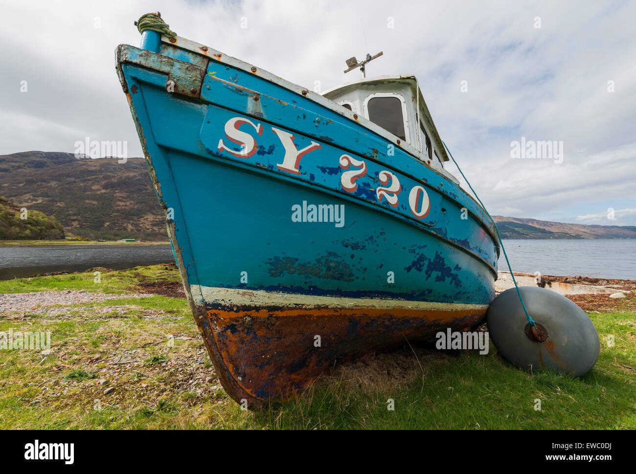 Ship at the shorte on loch Duich in the Highlands of Scotland, image Daan Kloeg, Commee Stock Photo