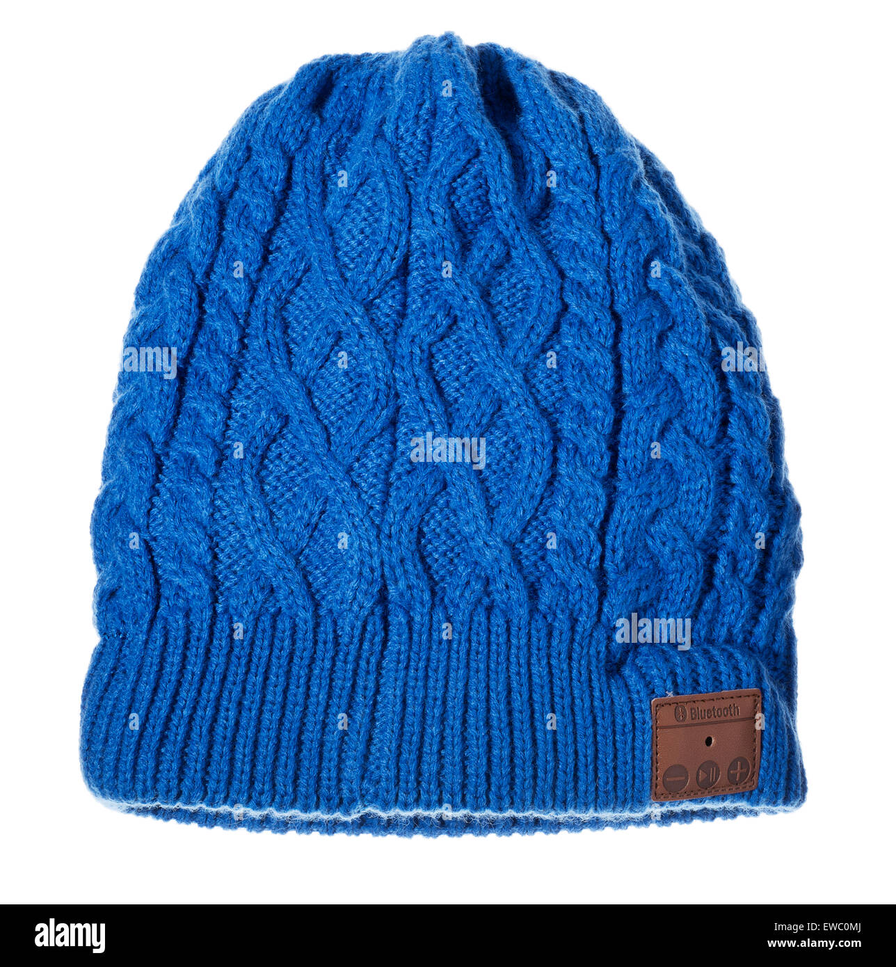 Blue woolen cable knit beanie hat with encased wireless bluetooth speakers. Stock Photo