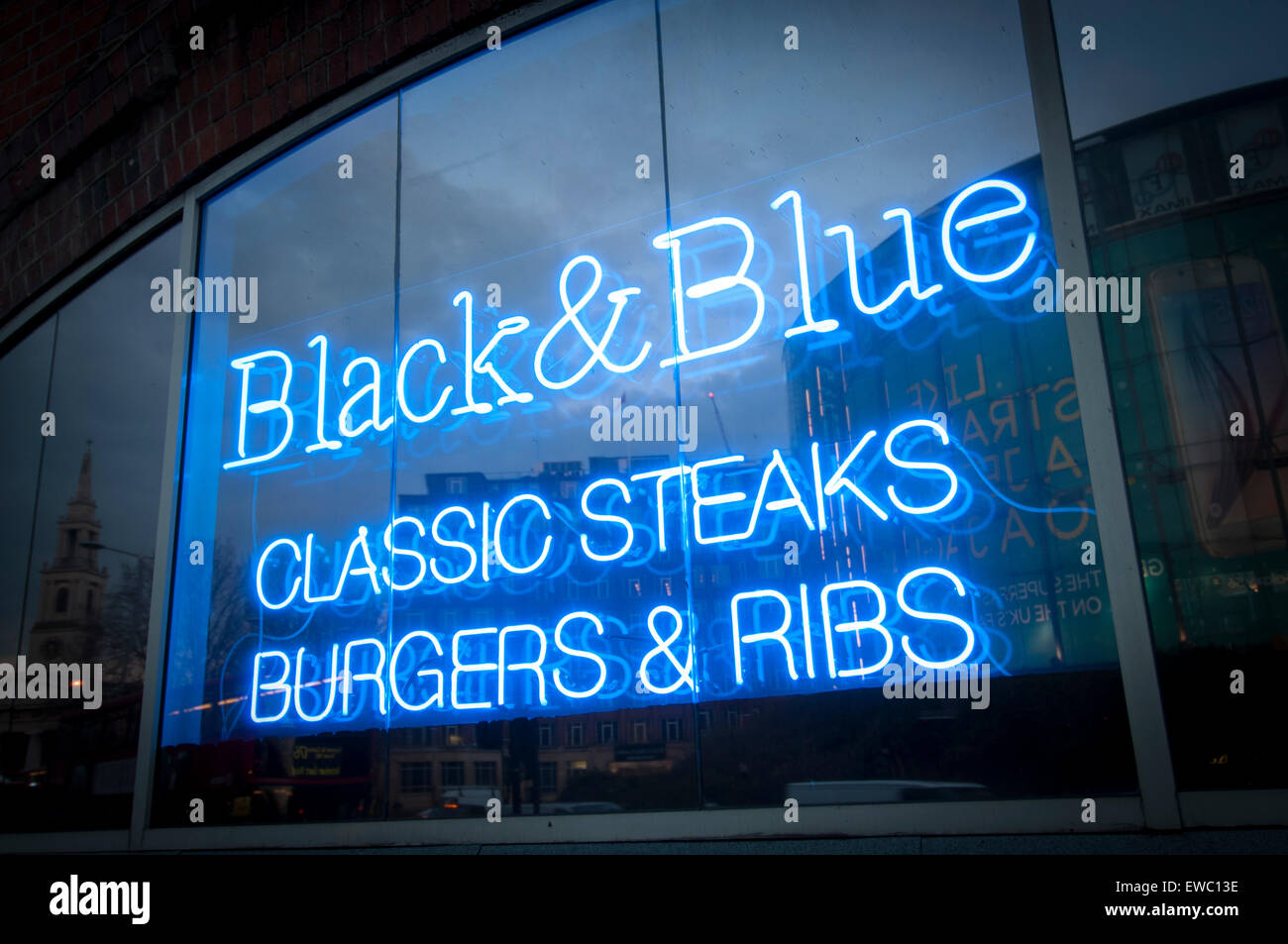 blue neon sign for Black & Blue restaurant in London, Waterloo Stock Photo