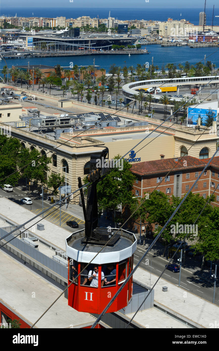 The Romantic route in Barcelona. Monjuic mountain. View of Barcelona Harbour. The red Teleferic cable car running across Barcelona Port in Barcelona Spain It runs from the beach in Barceloneta to Mountjuic. Montjuic Cable Car Above Harbour, Barcelona. Stock Photo