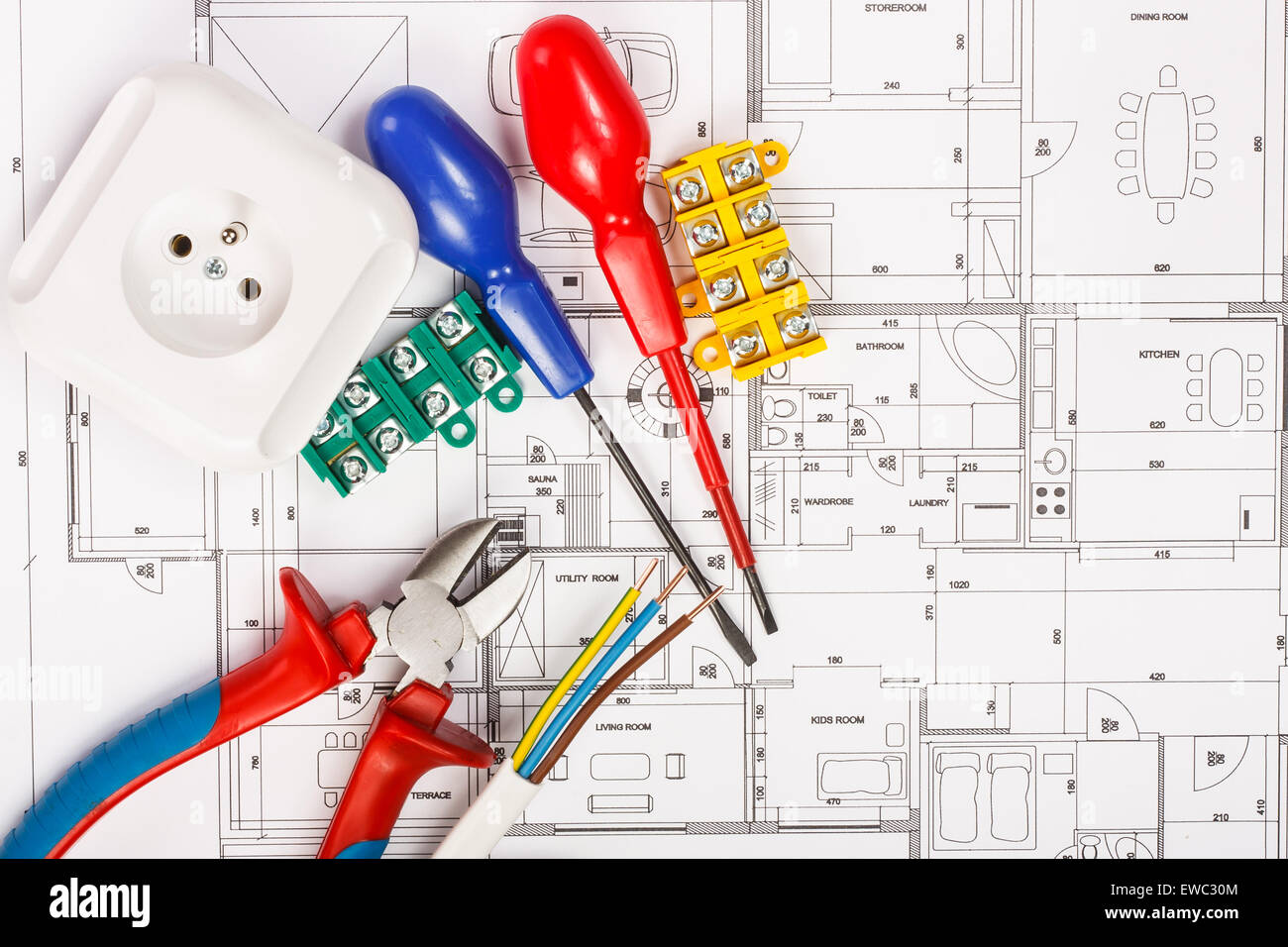 Electrical equipment and tools on house plans Stock Photo
