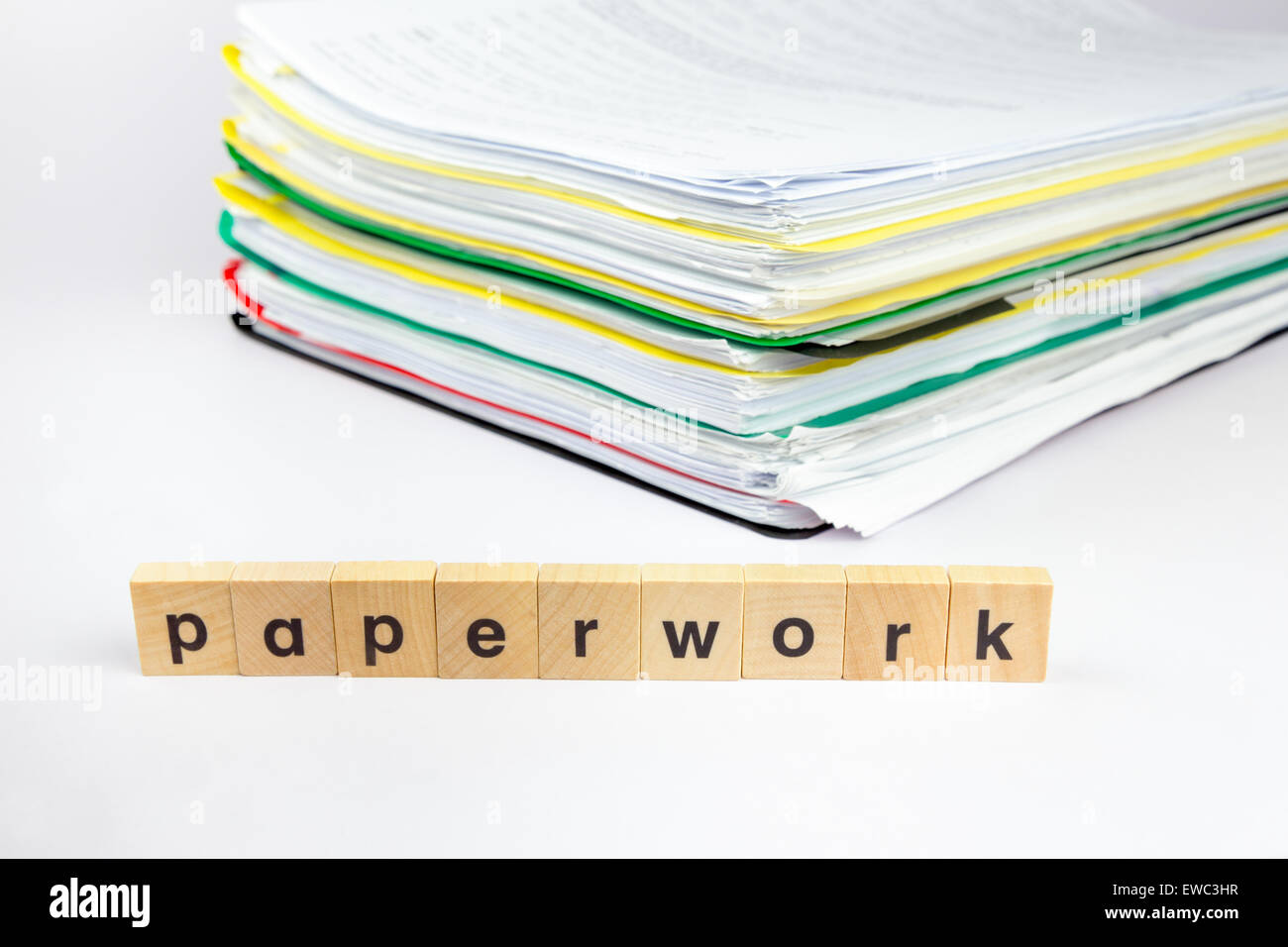 Stack of papers with word paperwork on wooden blocks Stock Photo Alamy