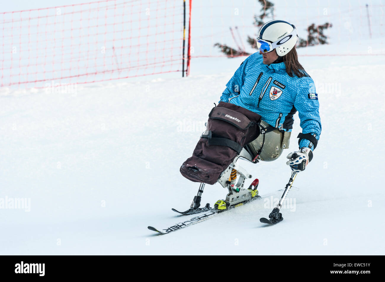 A disabled skier using specially-adapted ski equipment Stock Photo