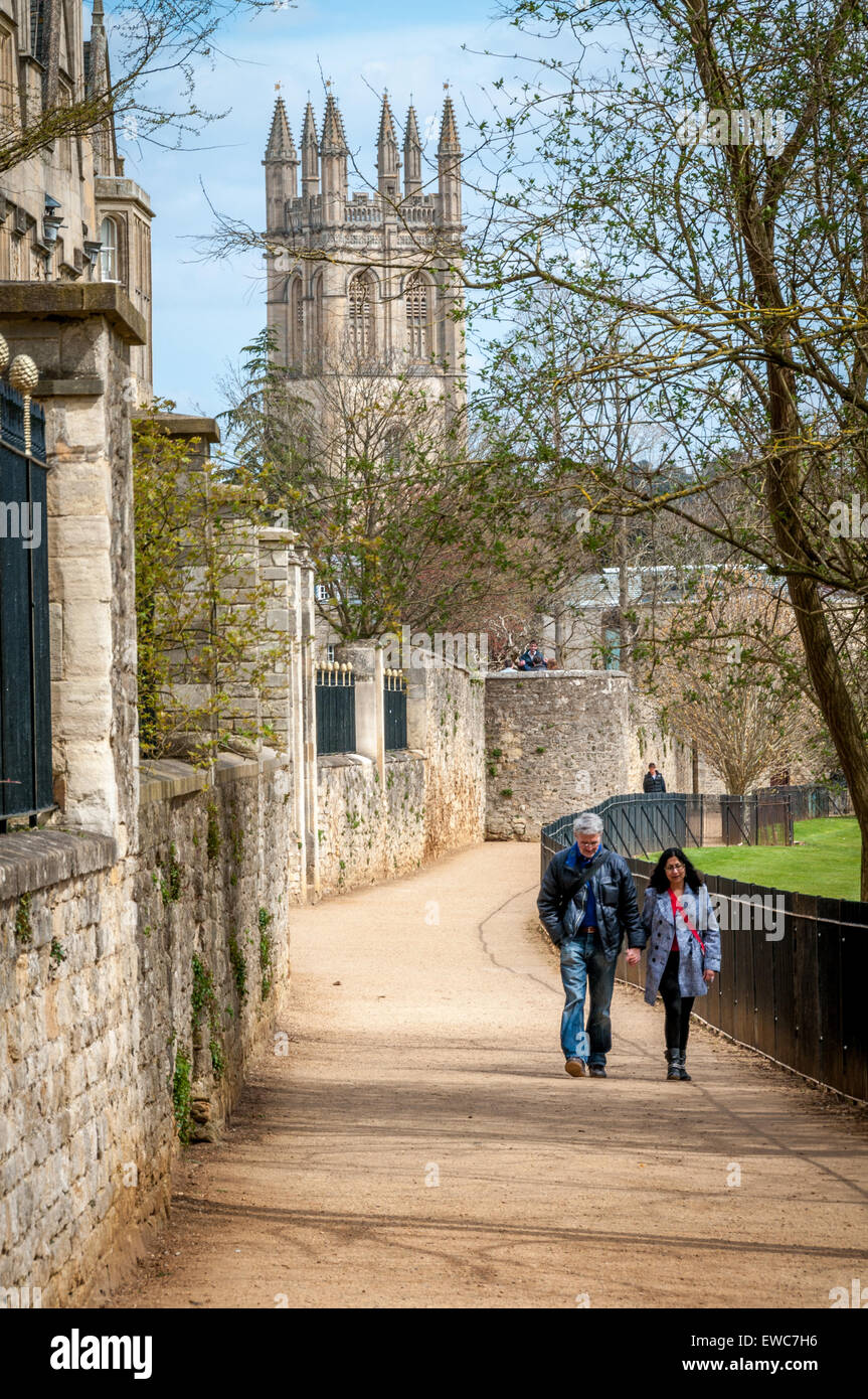 A couple is walking on the Dead Man's Walk outside the old city wall in