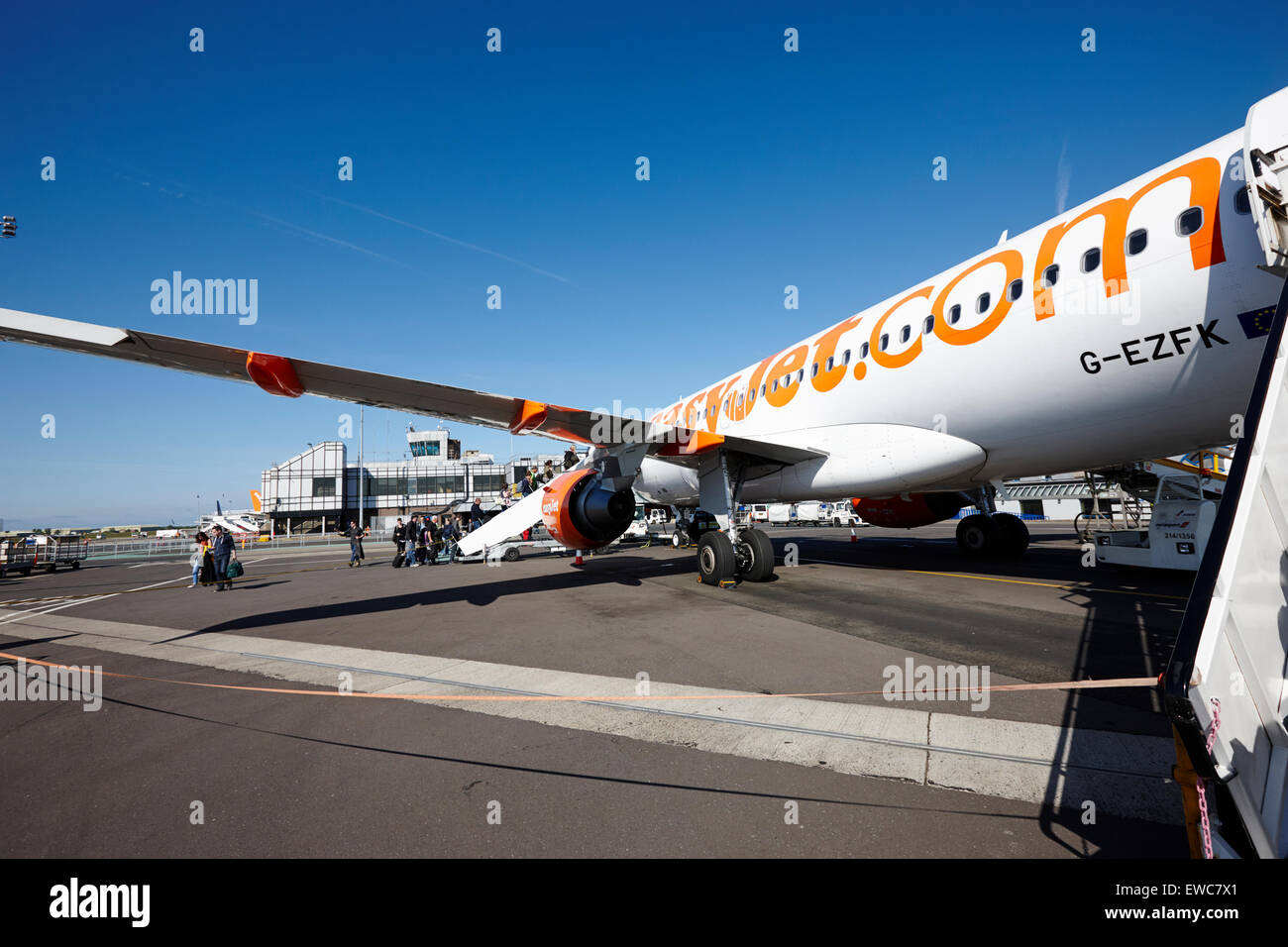 boarding easyjet aircraft by the rear steps Belfast International Airport UK Stock Photo