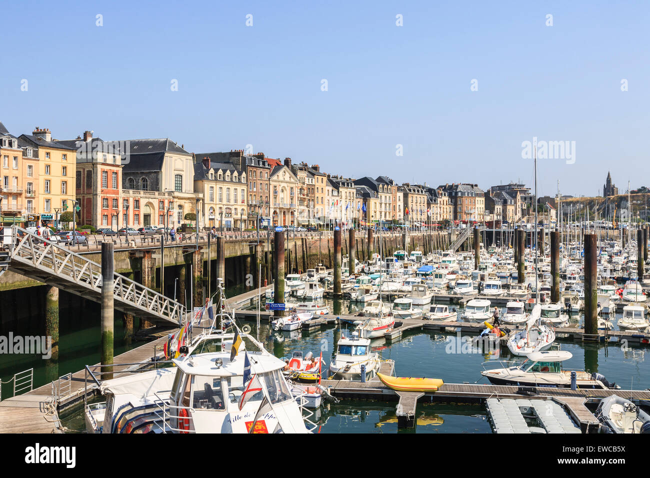 Boats moored at pontoons in Dieppe harbour, Normandy, on a sunny summer ...