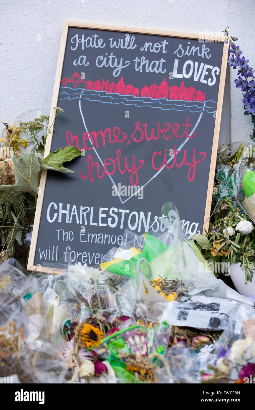 The city continues to mourn as flowers and signs decorate a makeshift memorial outside the historic Mother Emanuel African Methodist Episcopal Church June 22, 2015 in Charleston, South Carolina. Nine people killed at the church by white supremacist, Dylann Storm Roof last Wednesday. Stock Photo