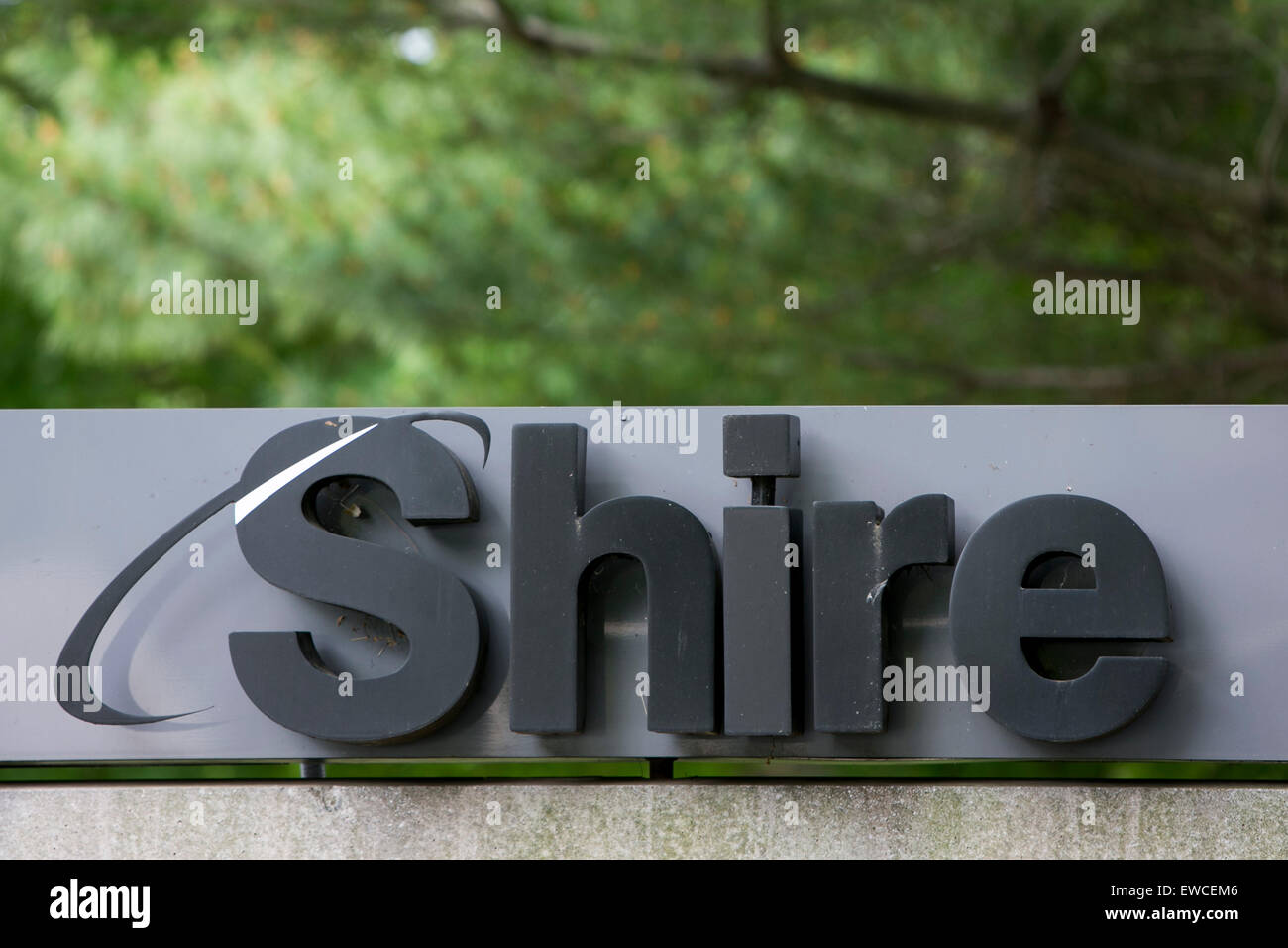 A logo sign outside of a facility occupied by the biopharmaceutical company, Shire PLC, in Chesterbrook, Pennsylvania. Stock Photo