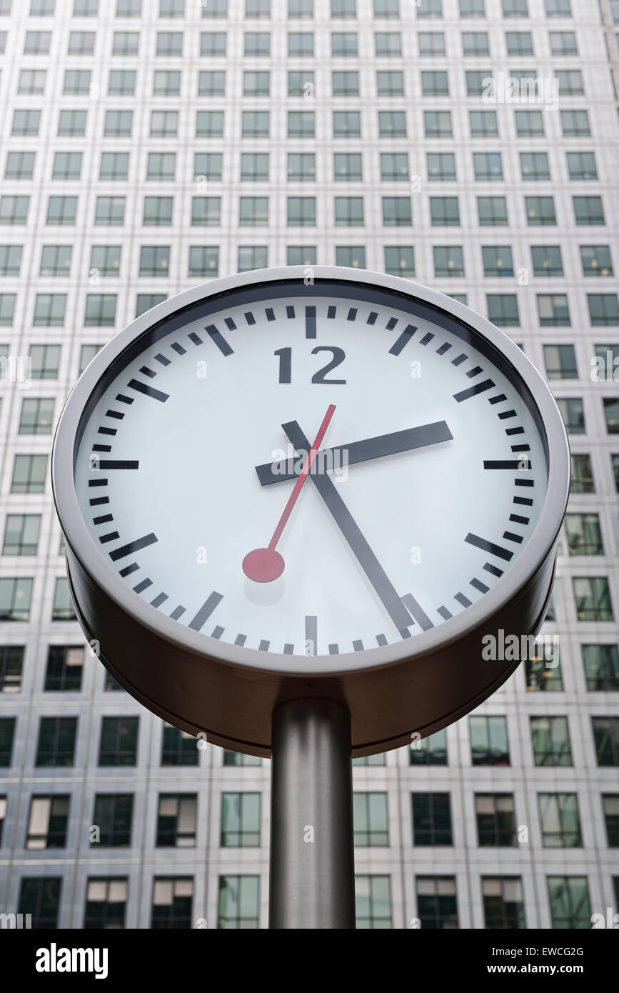 Clock Outside Canary Wharf Tower, Canary Wharf, Docklands, London, UK. Stock Photo