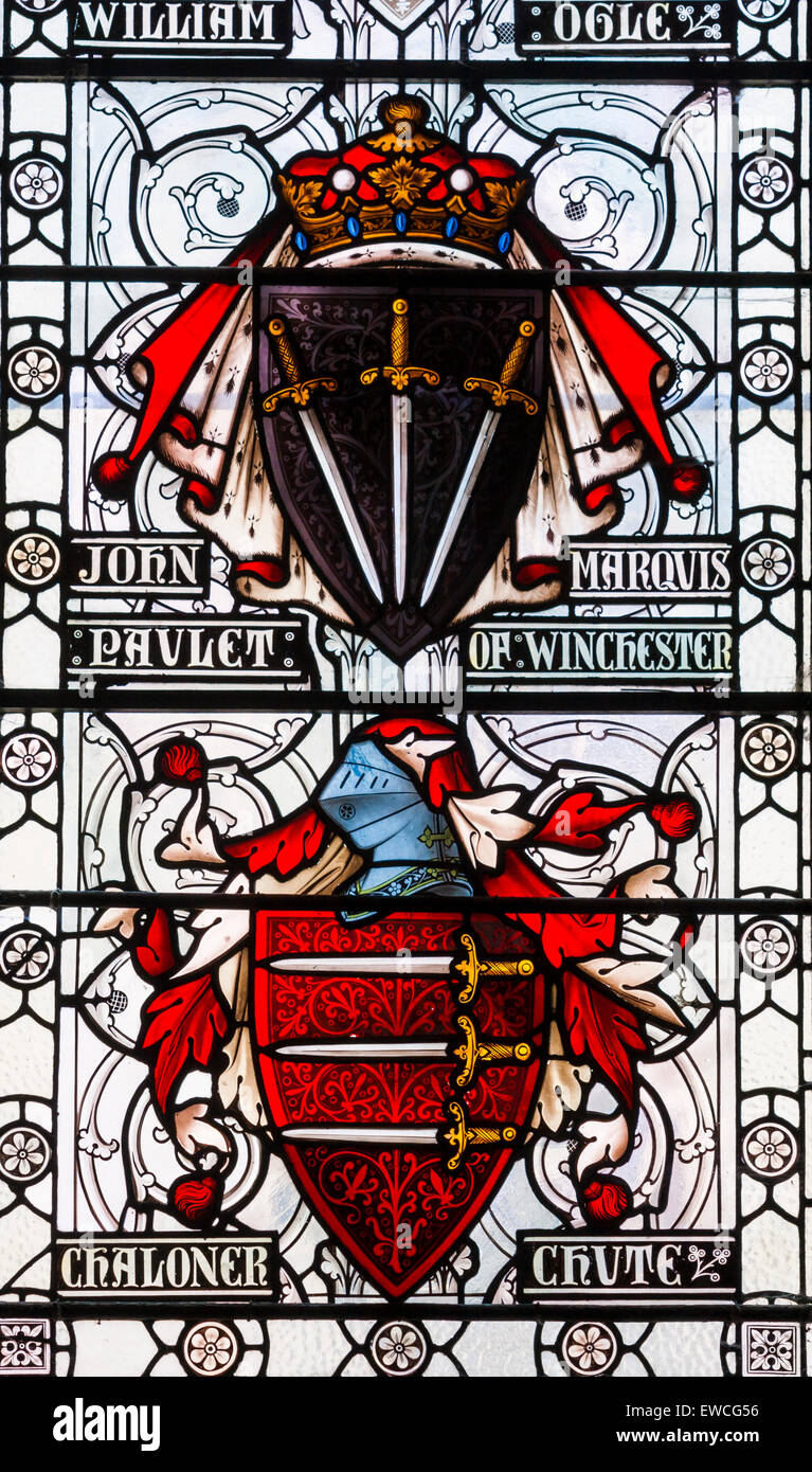 Stained glass window with the names John Paulet and Chaloner Chute in