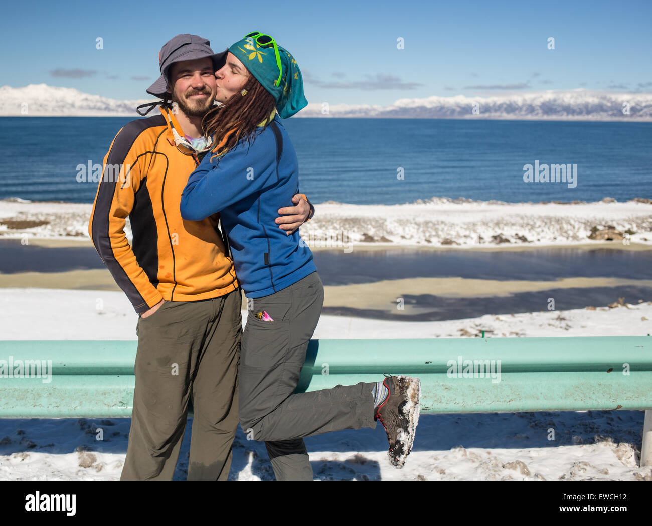 Couple traveling on winter roads Stock Photo