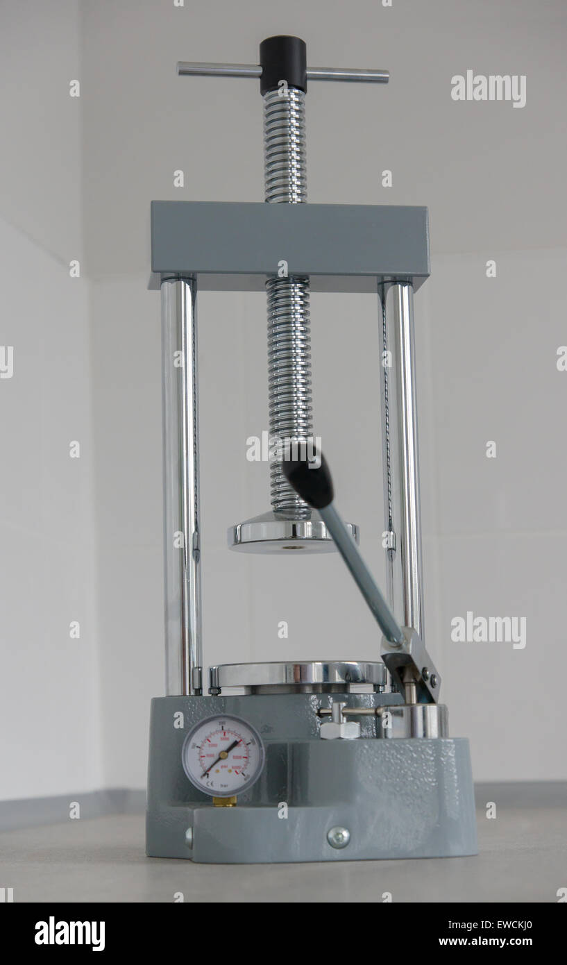 hydraulic press used in the dental laboratory for packing plastic and other  Stock Photo - Alamy