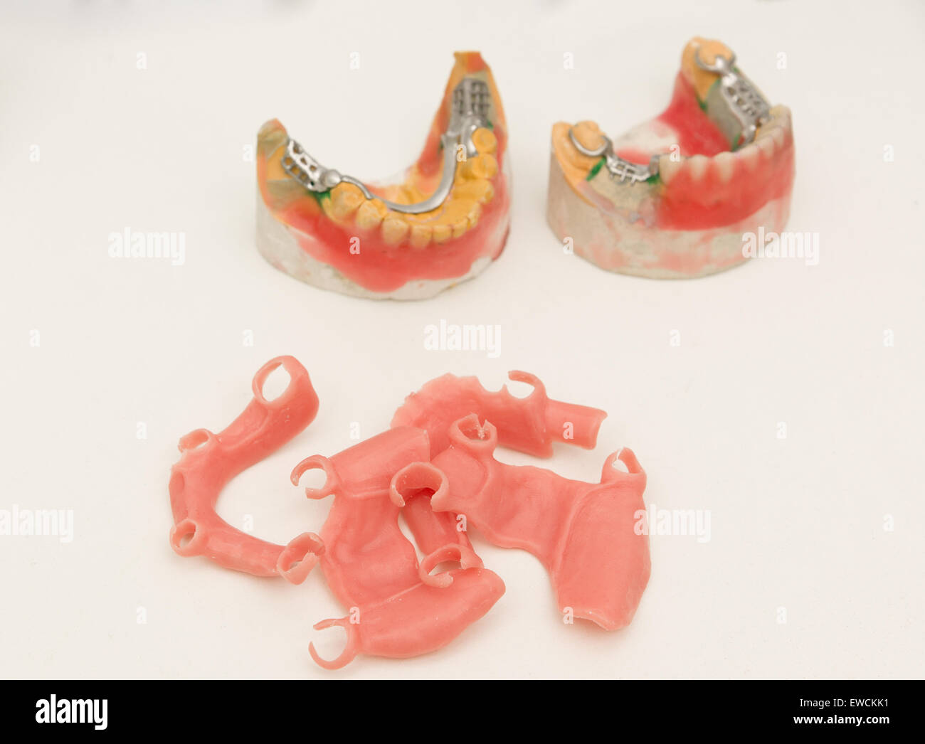 denture clasp on one of the stages of manufacturing in the dental
