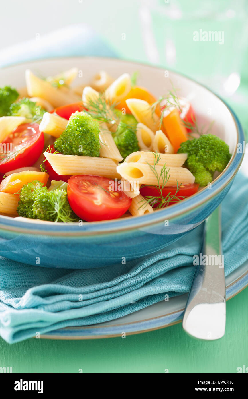 vegan pasta with broccoli tomato carrot Stock Photo Alamy