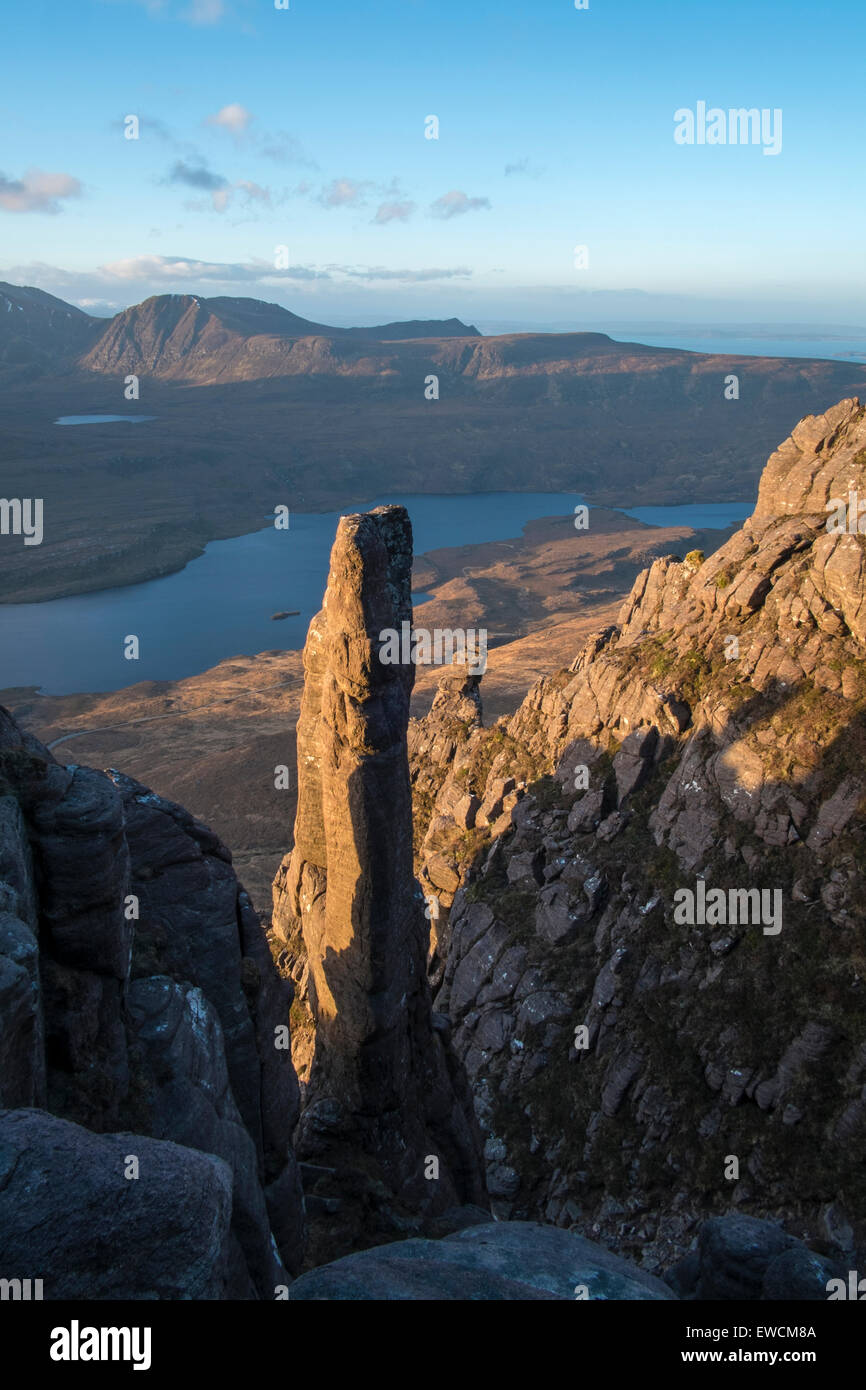 One of the stacs or pinnacles shortly after sunrise at the summit of Stac-Pollaidh, Sutherland Scotland Stock Photo