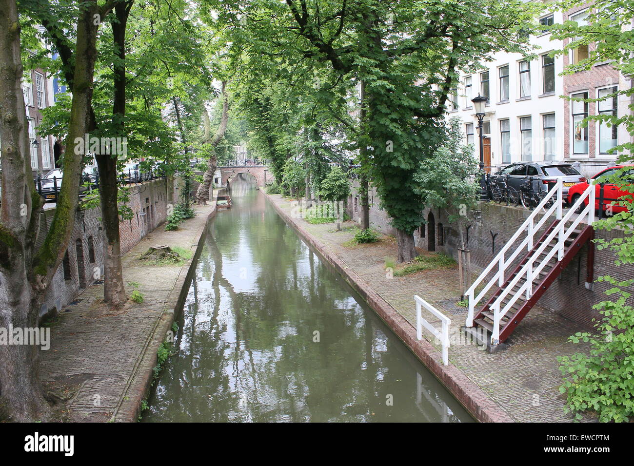 Nieuwegracht canal, a tree-shaded canal with lowered wharves in the  medieval inner city of  Utrecht, The Netherlands Stock Photo