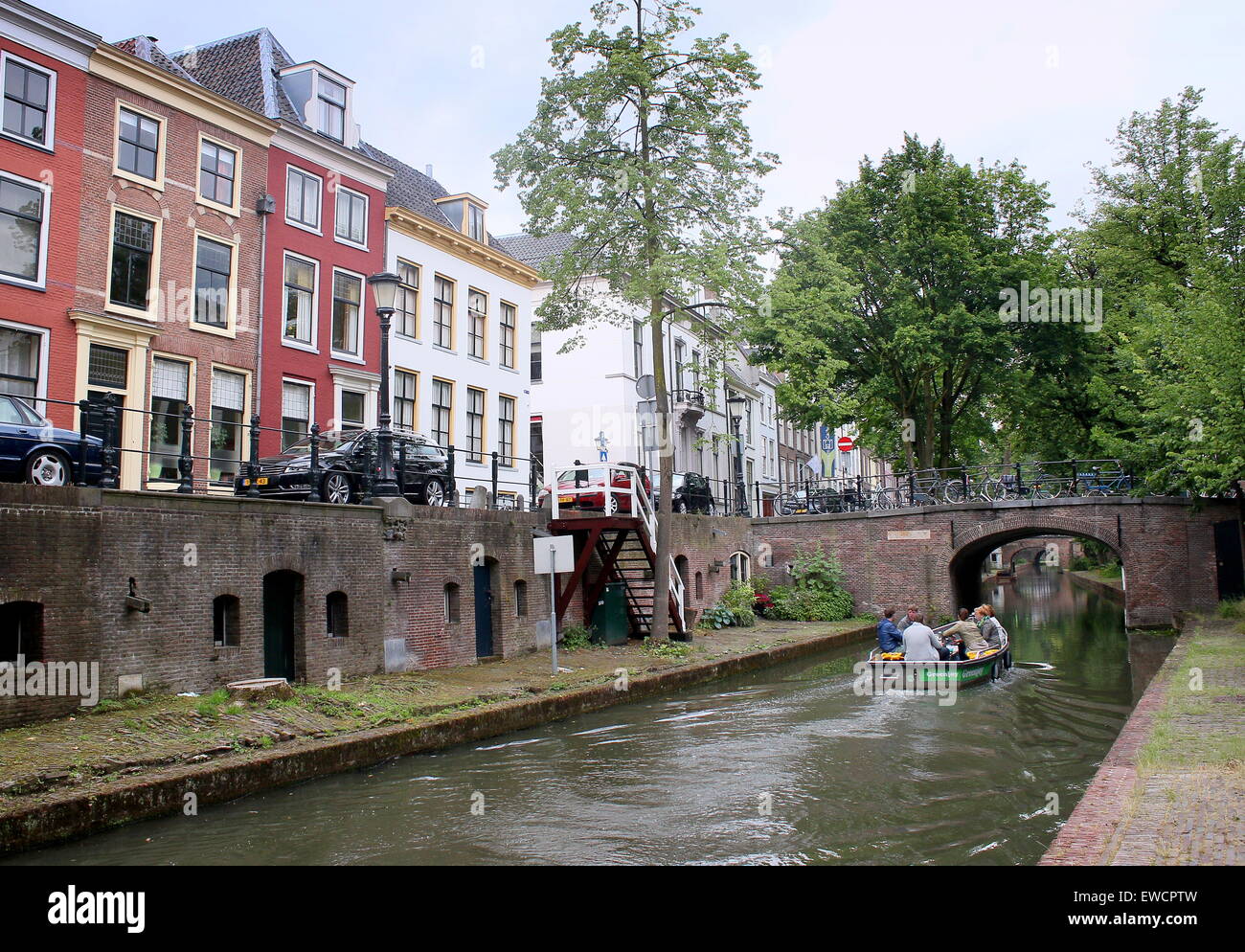 Boat with tourists at Nieuwegracht canal in the  medieval inner city of  Utrecht, The Netherlands Stock Photo