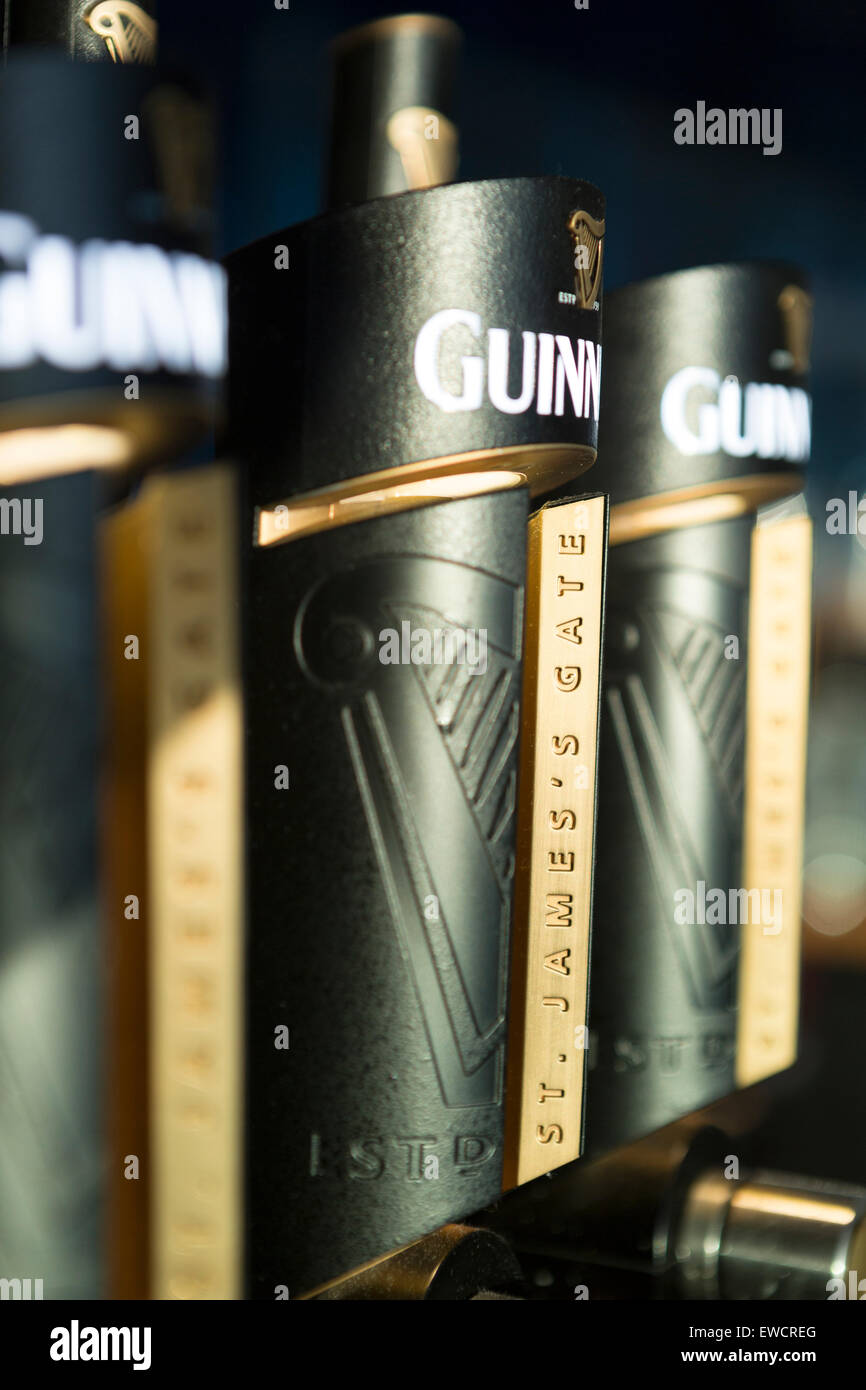 Ireland, Dublin, Guiness bar pumps Stock Photo Alamy