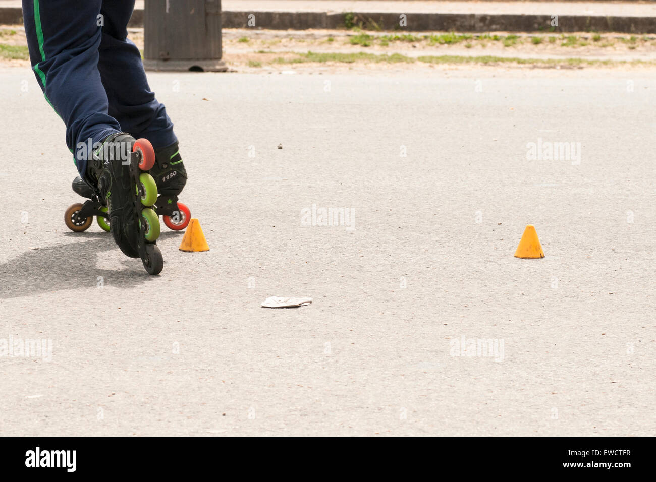 slalom with Inline skates Stock Photo Alamy