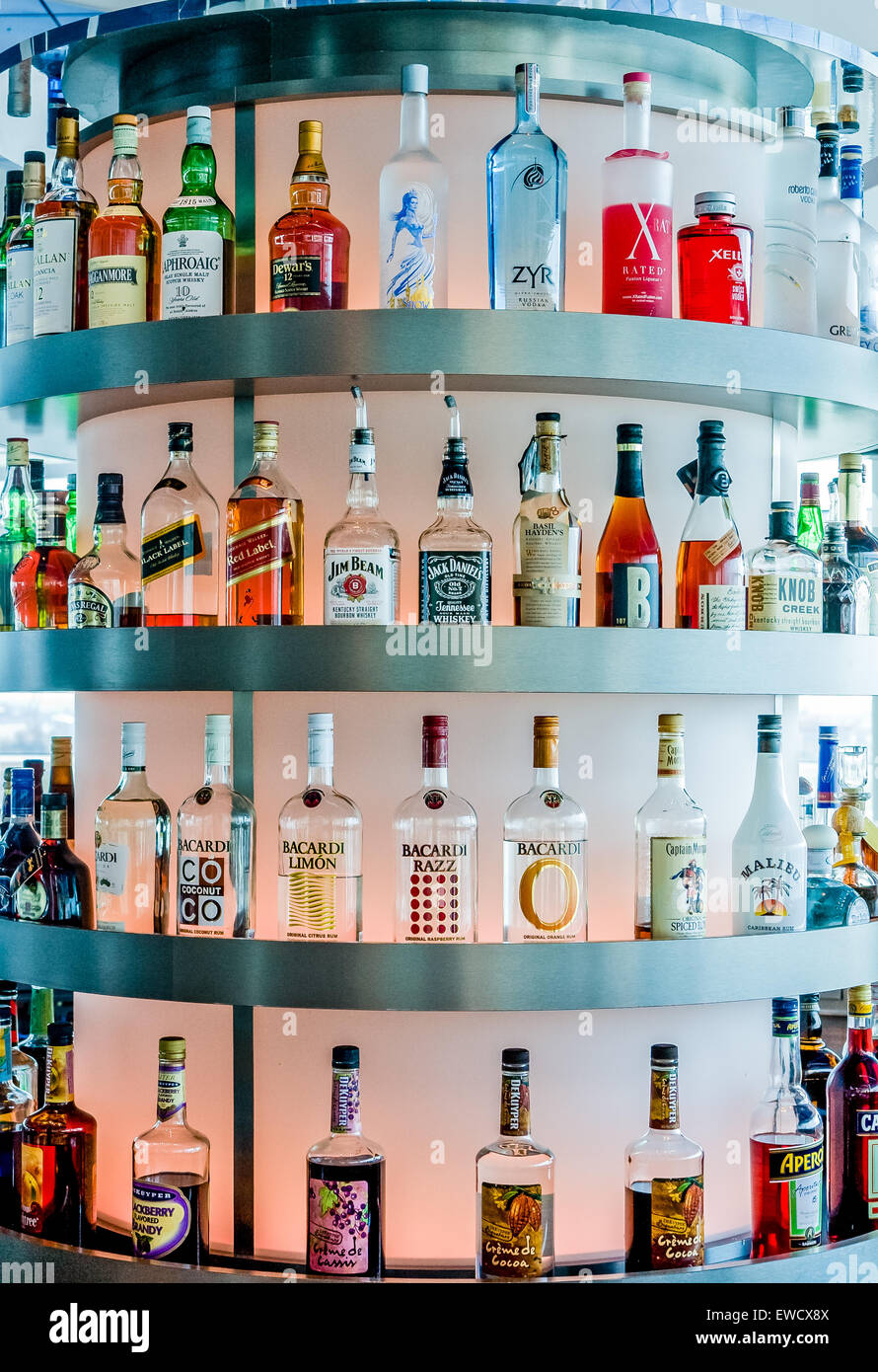 Photo of well stocked bar backlit in a night club Stock Photo Alamy