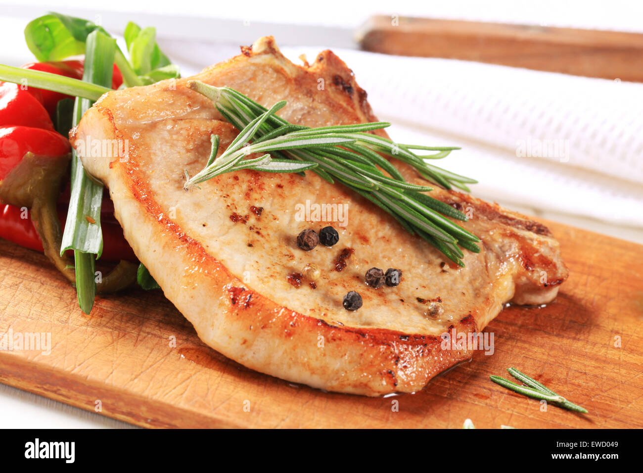 Pan seared pork chop with rosemary Stock Photo Alamy