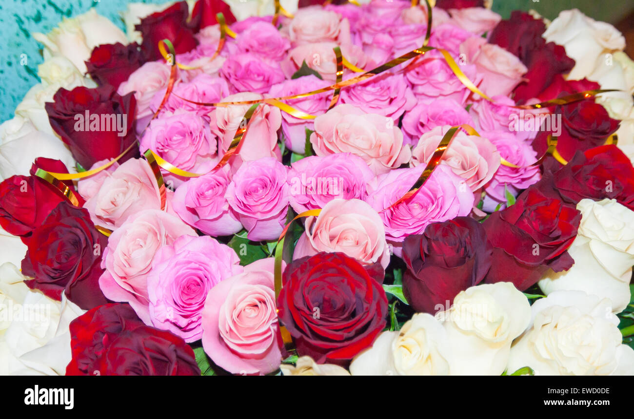 Pink faded roses bouquet with leaves Stock Photo - Alamy