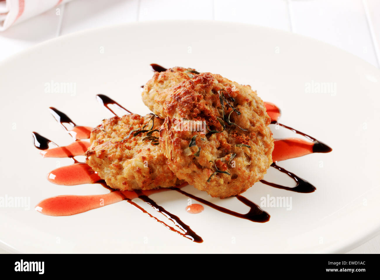 Vegetable burgers with balsamic vinegar sauce Stock Photo Alamy