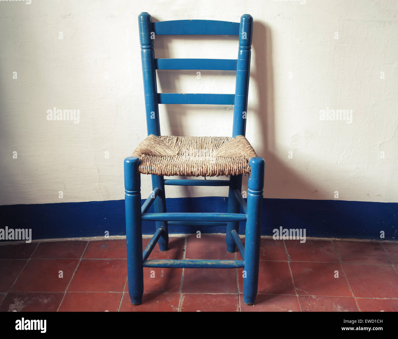 Wooden chair outlet with wicker seat