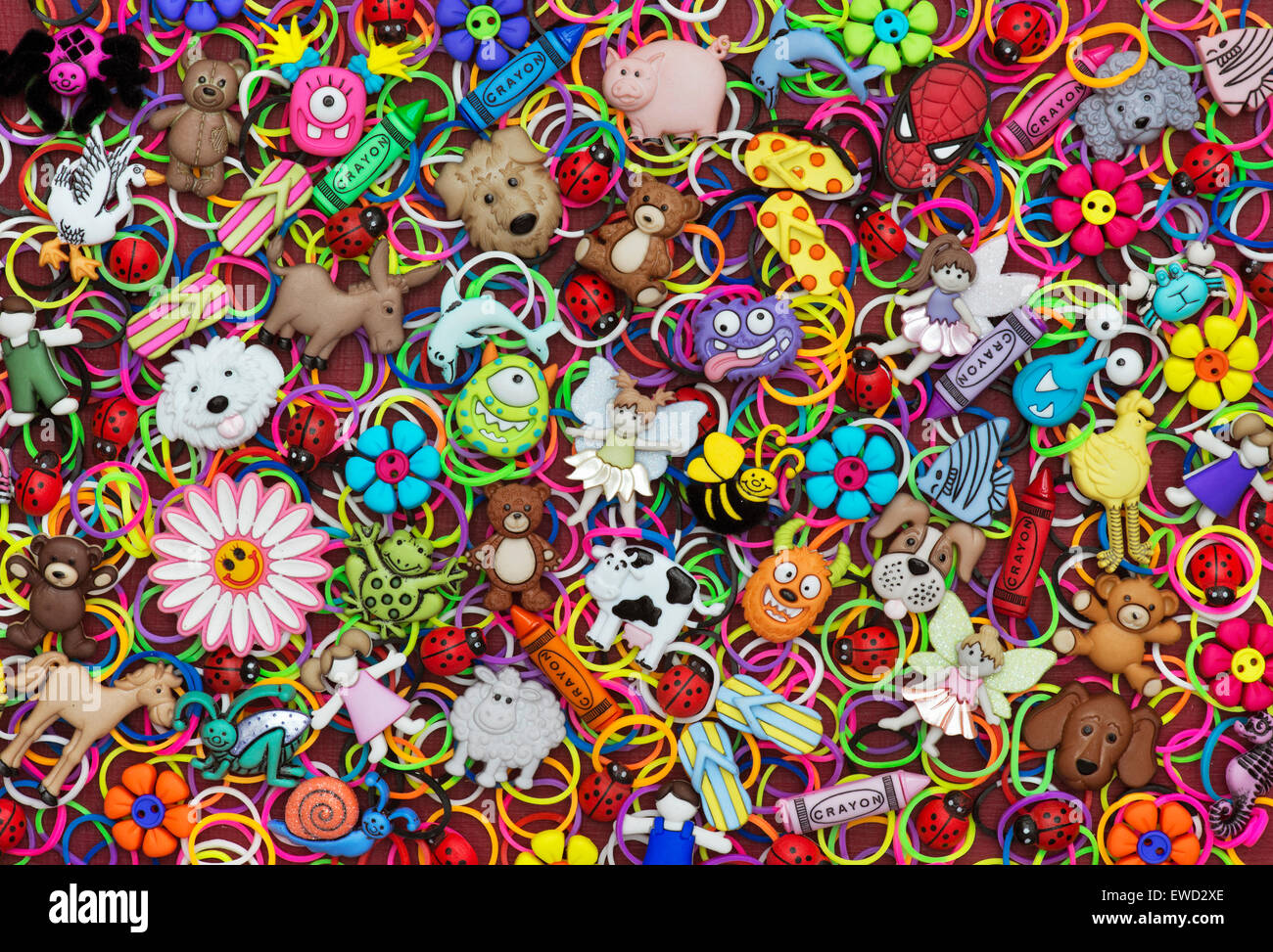 Childrens buttons, badges and loom rubber bands pattern Stock Photo