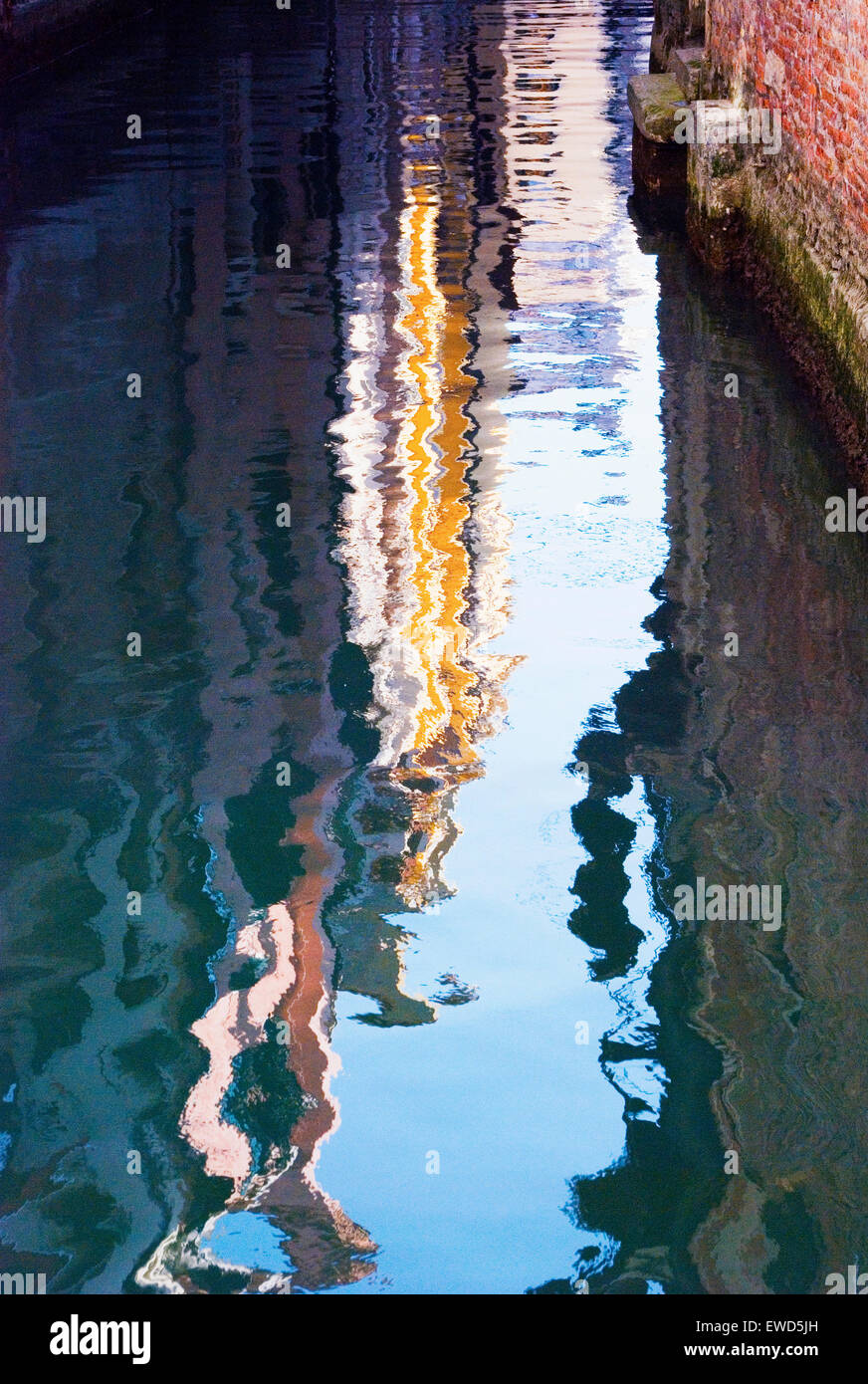 Colourful reflections in Venetian canal Stock Photo - Alamy